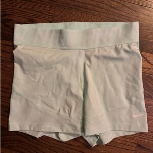 Sea foam Nike Pro, maybe used once, like new